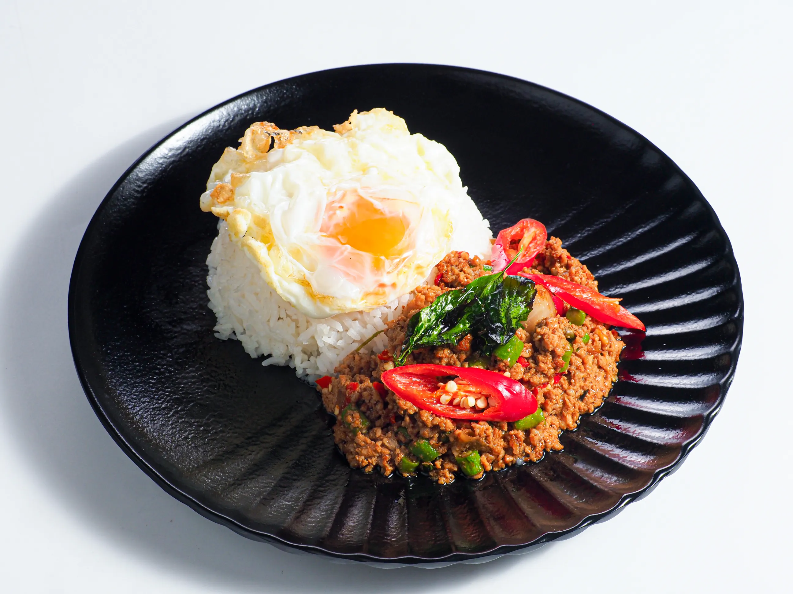 Thai basil minced pork rice fried egg restaurant food photography Singapore